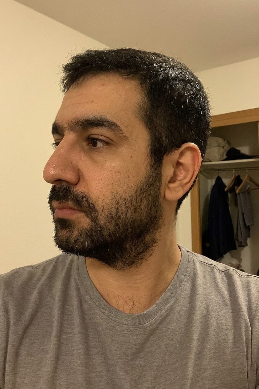 Omar Hassan (AI-generated example portrait): Side
