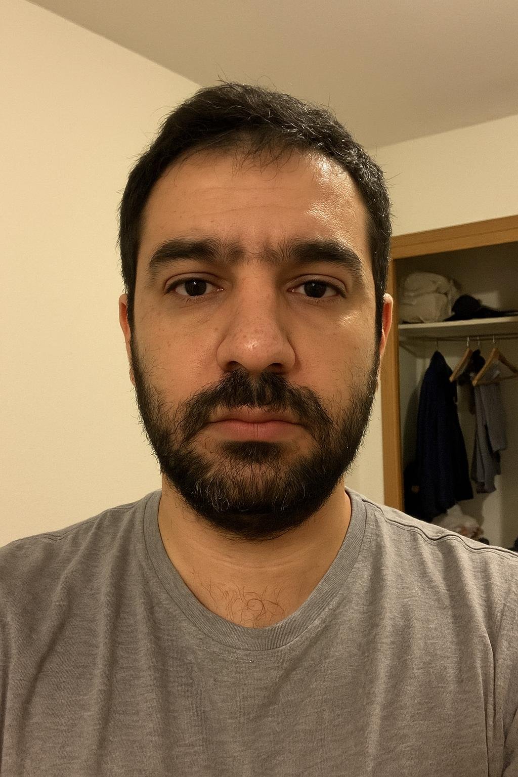 Omar Hassan (AI-generated example portrait) — Front